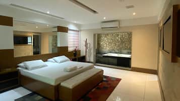 Suíte estúdio luxo | Wi-Fi de cortesia, roupa de cama