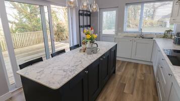 Fridge, electric kettle, toaster, cookware/dishes/utensils