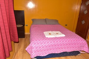 Deluxe Room | Down comforters, desk, laptop workspace, free WiFi