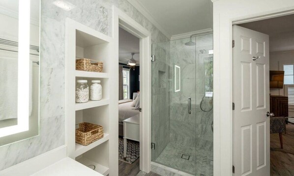 Shower, hair dryer, towels, soap