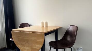 Chambre Quadruple Familiale, vue océan | Literie de qualité supérieure, couette en duvet d'oie