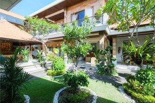 Quarto casal | Vista para o jardim