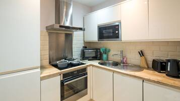 Apartment | Private kitchen | Fridge, microwave, oven, stovetop