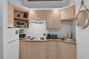 Fridge, microwave, coffee/tea maker, toaster