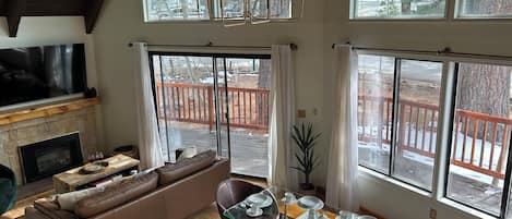 Smart TV, fireplace, foosball, books