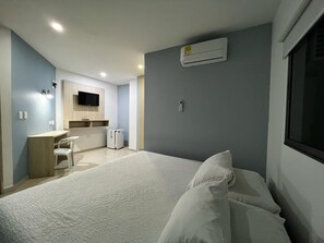 Deluxe Room | 1 bedroom, soundproofing, free WiFi, bed sheets - Hotel Lagos Apartaestudios (Barranquilla)