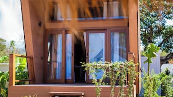 Quarto casal júnior, vista para a piscina | Terraço/pátio