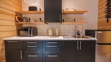 Fridge, microwave, coffee/tea maker, toaster