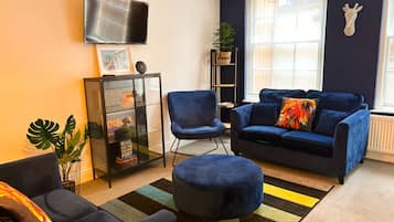 Apartamento standard, para não fumantes | Área de estar | Smart TV