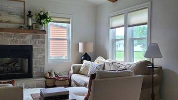 Smart TV, fireplace, DVD player, books