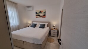 3 chambres, coffre-fort, bureau, fer et planche à repasser
