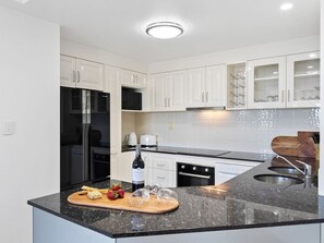 Fridge, microwave, oven, stovetop - 3 BEDROOM CBD WATERFRONT LUXURY APARTMENT (Cairns City)