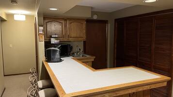 Fridge, microwave, coffee/tea maker, toaster