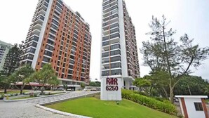 A high-rise residential building with a prominent sign indicating unit number 6250.