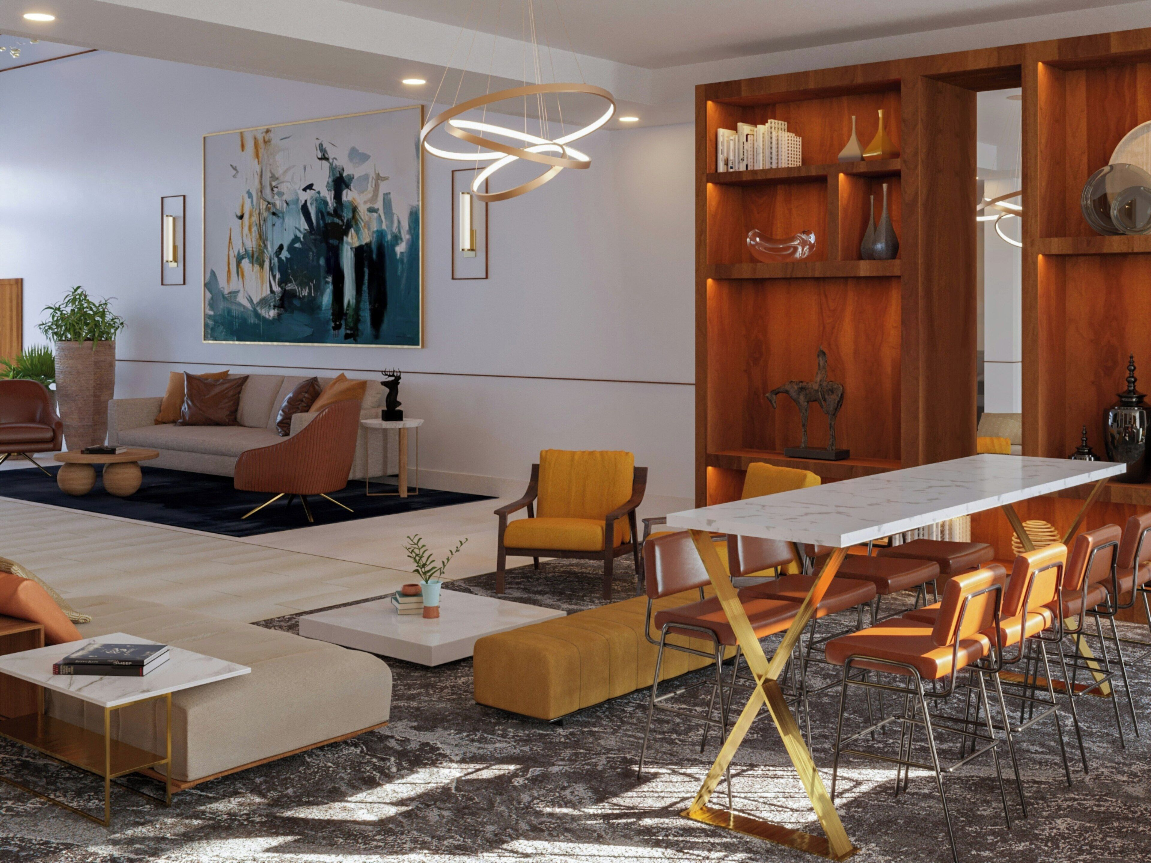 Ein modernes Wohnzimmer mit einer Couch, Sesseln, einem Couchtisch und einem Essbereich mit Tisch und Stühlen.