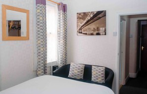 Standard Apartment, Ground Floor | Living area | 38-inch flat-screen TV with digital channels - The Chadwick Holiday Flats (Skegness)