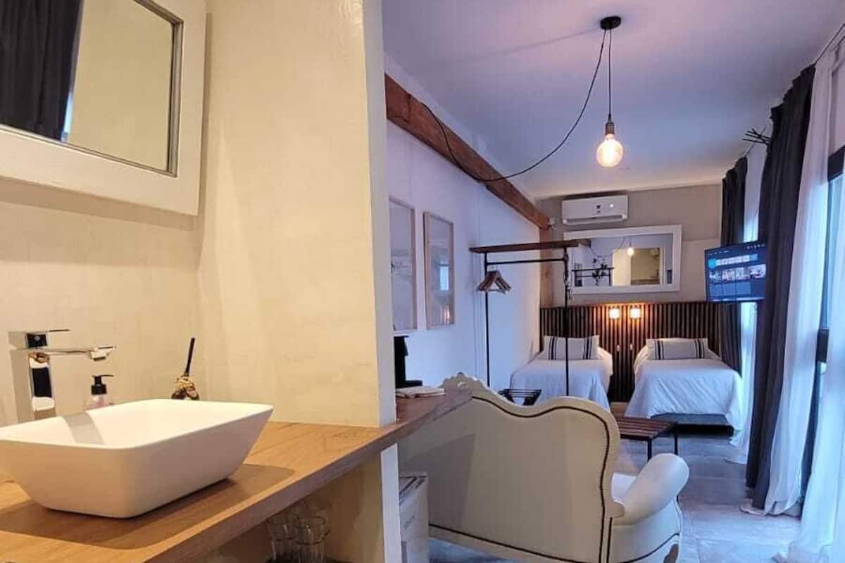 Condo Economy, quang cảnh vườn | 1 phòng ngủ, bộ đồ giường cao cấp, chăn bông, két bảo mật tại phòng 