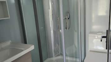 Shower, towels, toilet paper