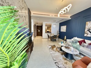 65-inch LED TV with satellite channels - Cosmos Living Luxurious Sobha Hartland (Dubai)