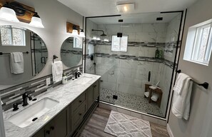 Shower, hair dryer, towels, soap