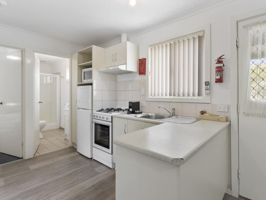 Family Cabin | Private kitchen | Full-size fridge, microwave, oven, stovetop