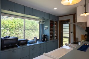 Fridge, microwave, stovetop, cookware/dishes/utensils