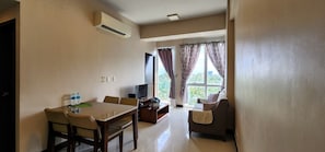 TV - Your Minimalist One Bedroom Home with Pool with WiFi & Netflix (Lapu-Lapu City)