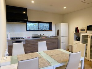 Fridge, microwave, stovetop, cookware/dishes/utensils