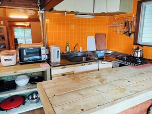 Fridge, microwave, stovetop, cookware/dishes/utensils