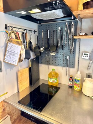 Fridge, microwave, stovetop, cookware/dishes/utensils