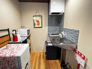 Fridge, microwave, cookware/dishes/utensils