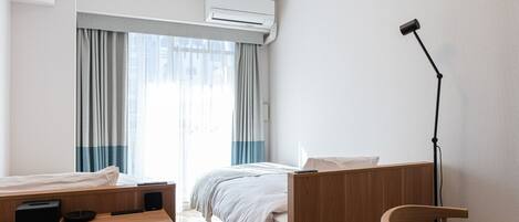 1 室のベッドルーム、デスク、WiFi (無料)、ベッドシーツ