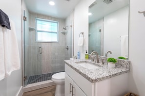 Hair dryer, towels, soap, shampoo