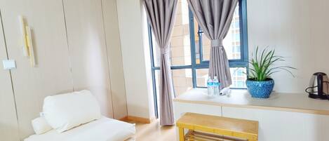 Laptop workspace, free WiFi, bed sheets