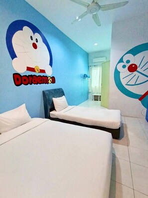 A room with two beds, a ceiling fan, and wall art featuring Doraemon. - Animation Homes I Meru Raya IPOH I by Grab A Stay l 16pax max (Ipoh)