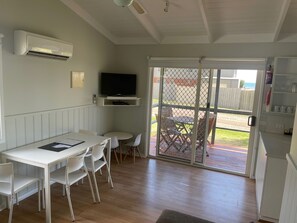 Standard Poolside 2 Bedroom Cabin | Free cots/infant beds, bed sheets