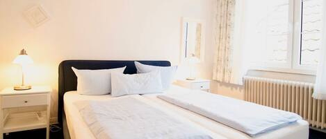 1 slaapkamer, een strijkplank/strijkijzer, wifi