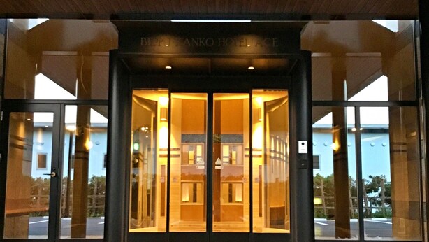 A hotel entrance with a glass door and a sign above reading "BETHANY HOTEL". - BEPPU KANKO HOTEL ACE (Beppu)