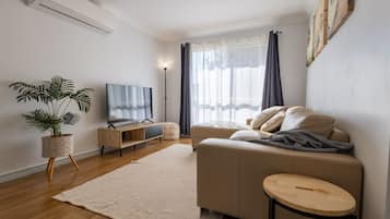 TV, fireplace, books, offices