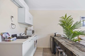 Fridge, microwave, coffee/tea maker, toaster