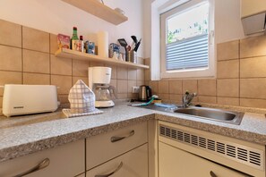 Réfrigérateur, four, plaque de cuisson, lave-vaisselle