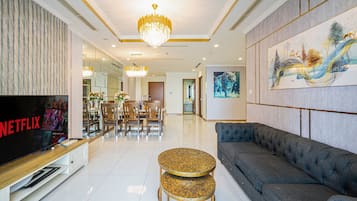 Deluxe Apartment, Balcony, City View | Television