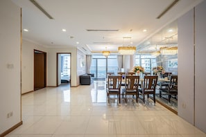 Deluxe Apartment, Balcony, City View | Living area | Smart TV, fireplace, video game console, Netflix - Landmark Condotel Art By KaySuite  (Ho Chi Minh City)