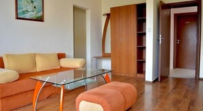 Suite – standard, hageutsikt | Oppholdsområde