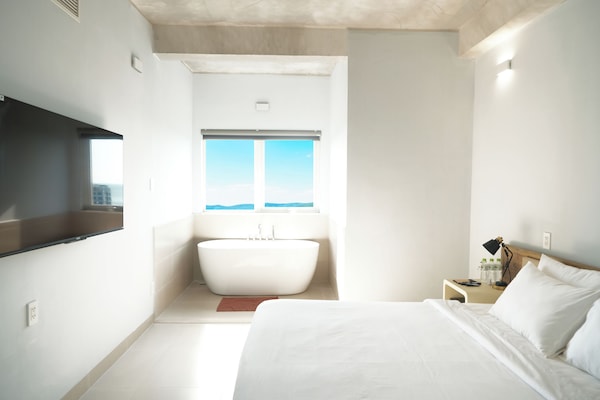 Premium Suite, Ocean View | Egyptian cotton sheets, premium bedding, pillow-top beds, minibar