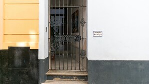 A gated entrance with a metal gate and a sign reading "Casa de la Cultura." - Holiday Home in Cadiz by the Sea (Cadiz)