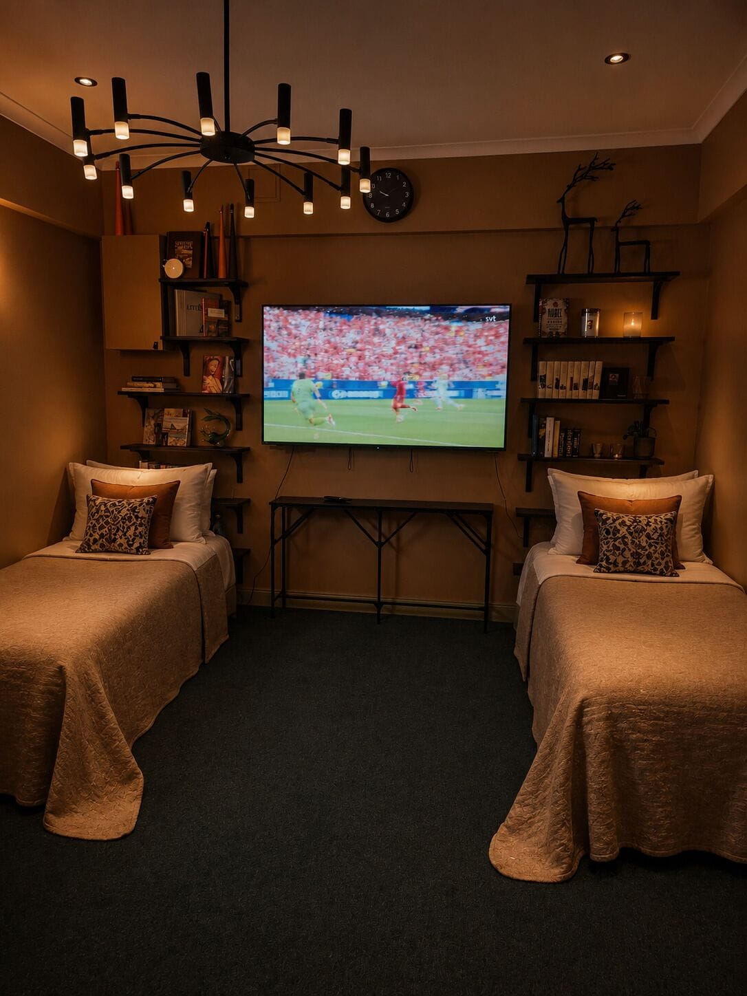 A cozy room with two beds, a TV, a bookshelf, and a unique ceiling light fixture.