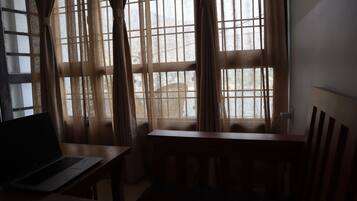 Deluxe Apartment | Living area | TV