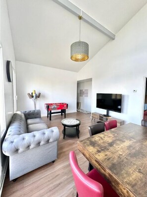 Smart TV, foosball, table tennis, books