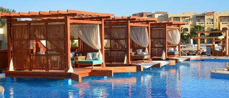 5 bars/lounges, poolside bar, beach bar